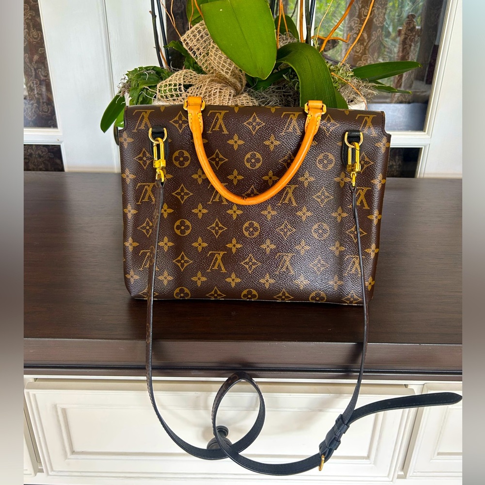 Louis Vuitton
Marignan Handbag Monogram Canvas with Leather $1600 - Picture 9 of 16